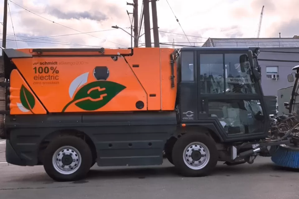 Electric bike lane sweeping truck